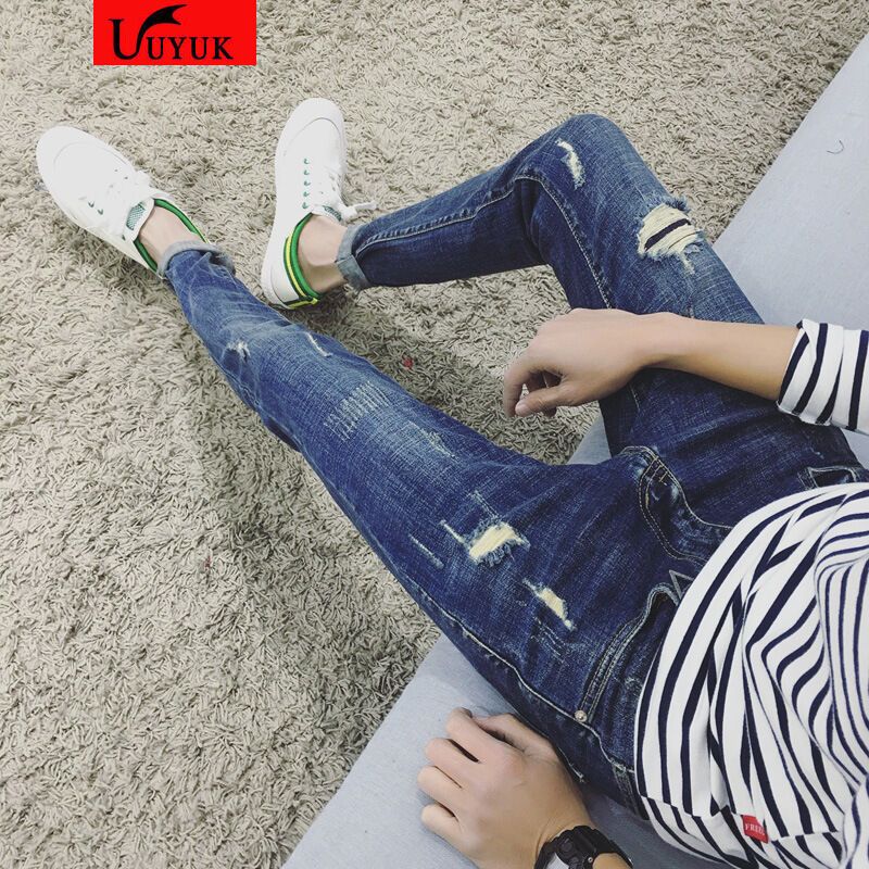 UYUK弹力破洞紧身牛仔裤男韩版小脚修身型日