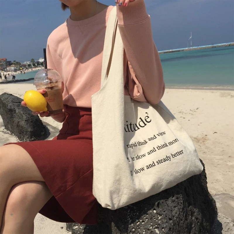 唐糖包袋韩版简约大容量字母帆布包手提带女士大包百搭单肩包_1 attitude水洗帆布包