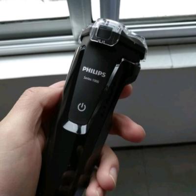 飞利浦(Philips)电动剃须刀S1010 旋转式三刀头充电式男士刮胡刀 干湿双剃全身水洗 贴面舒适剃须晒单图