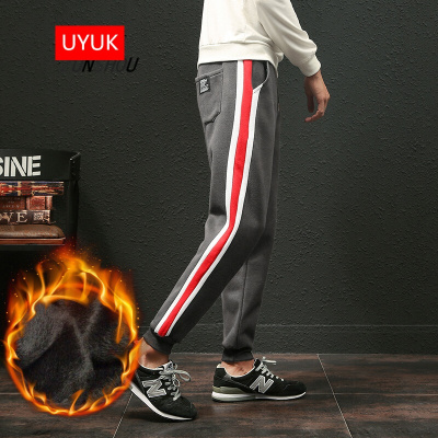 UYUK休闲裤男2017冬季新款青少年学生休闲修身加绒加厚保暖休闲裤男士条纹时尚小脚裤子男