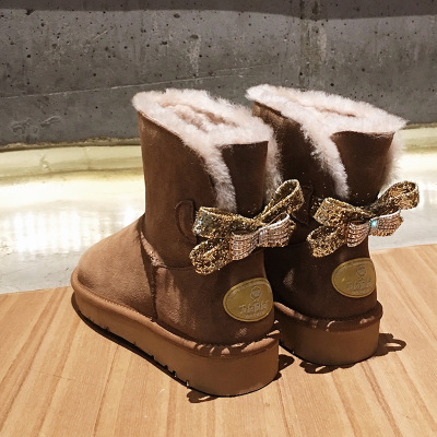 冬季新款加厚蝴蝶结水钻羊皮毛一体水钻雪地靴短靴女棉靴